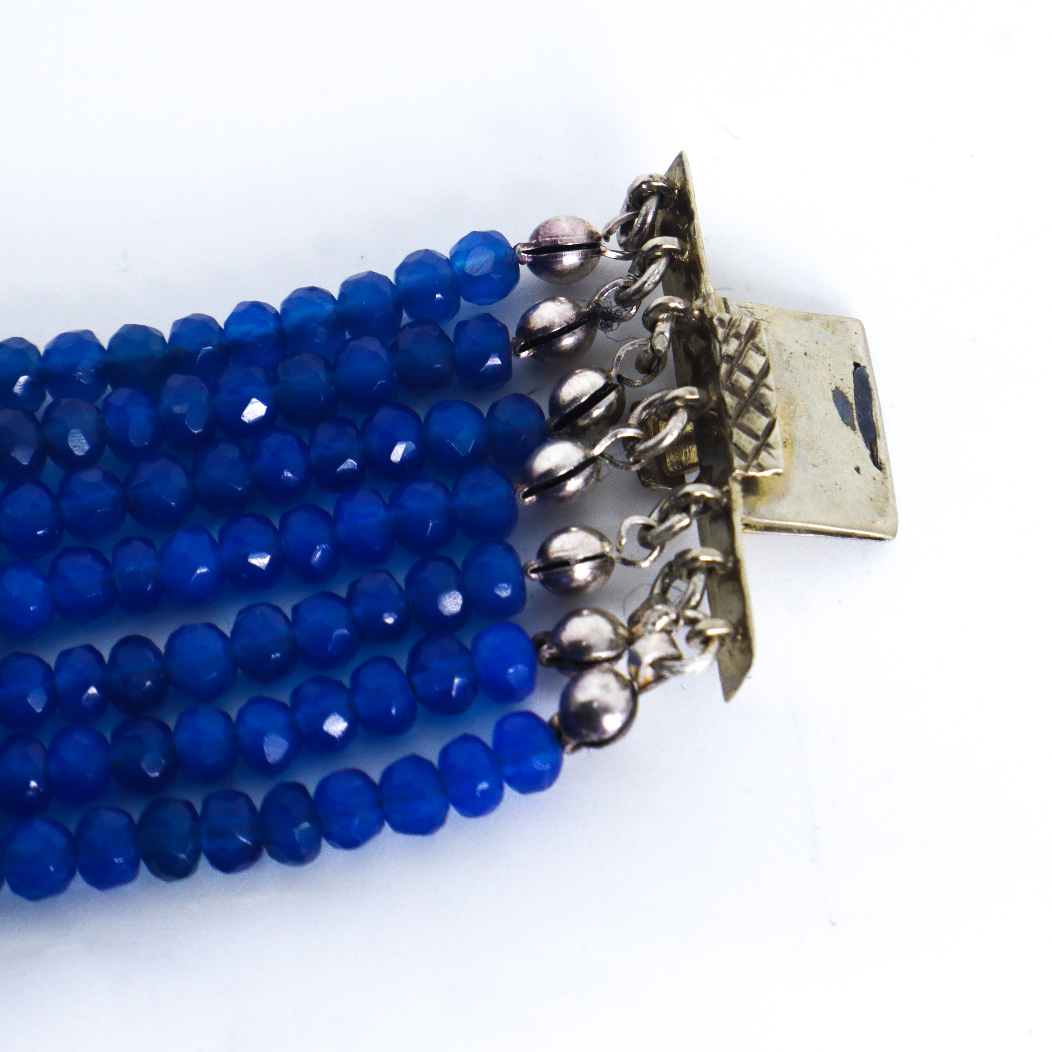 Bracciale a fascia in oro 585 (14 KT) con granati e pietre sulla susta e lungo le 3 bande di sost...