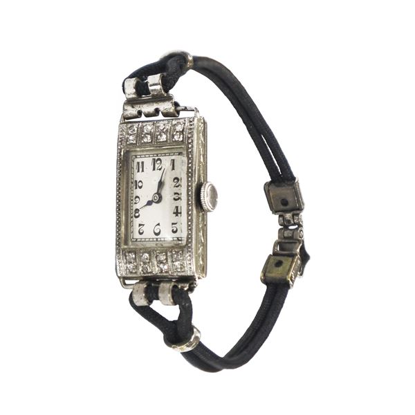 Zenith Orologi - 18kt gold rectangular dial watch with diamonds on the top and bottom and black cord strap