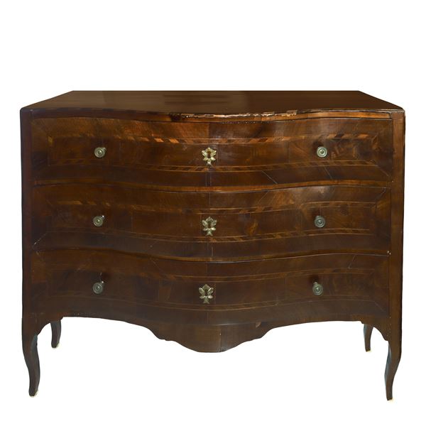 Louis XV chest of drawers with three drawers threaded in light wood with rectangular panels, wavy front 