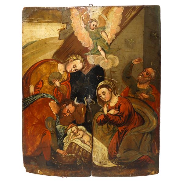 Natività con adorazione dei pastori e angelo in testa al centro