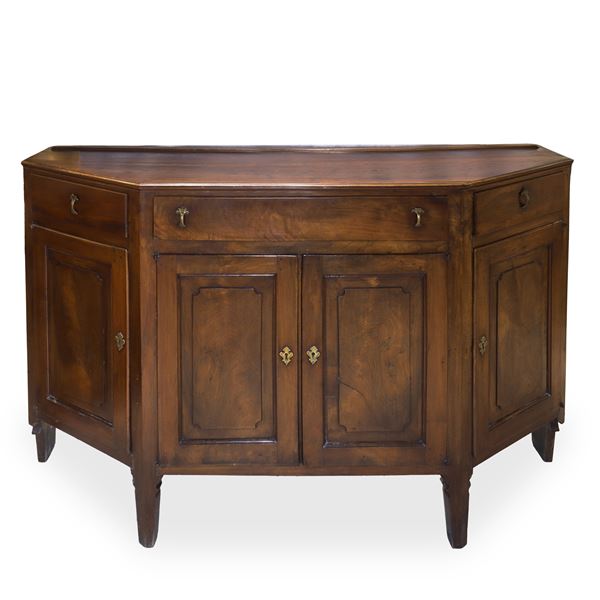 Low sideboard/cupboard in solid walnut wood, rounded at the sides with upper drawers and doors in the lower part, truncated pyramid feet