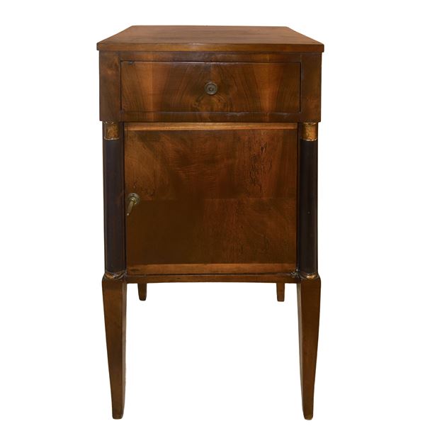 Directoire bedside table in walnut with black ebonized columns on the sides, truncated pyramid feet
