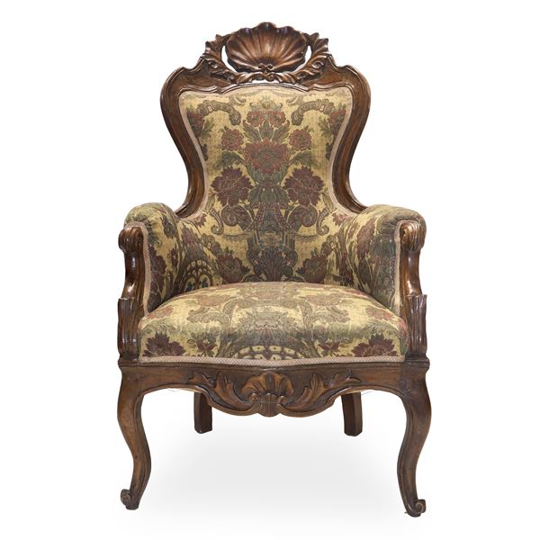 Louis Philippe armchair upholstered with carved wooden backrest and cabriole legs