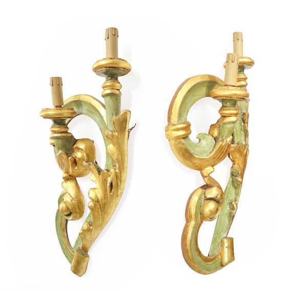 Pair of two-light wall sconces in gold and green wood