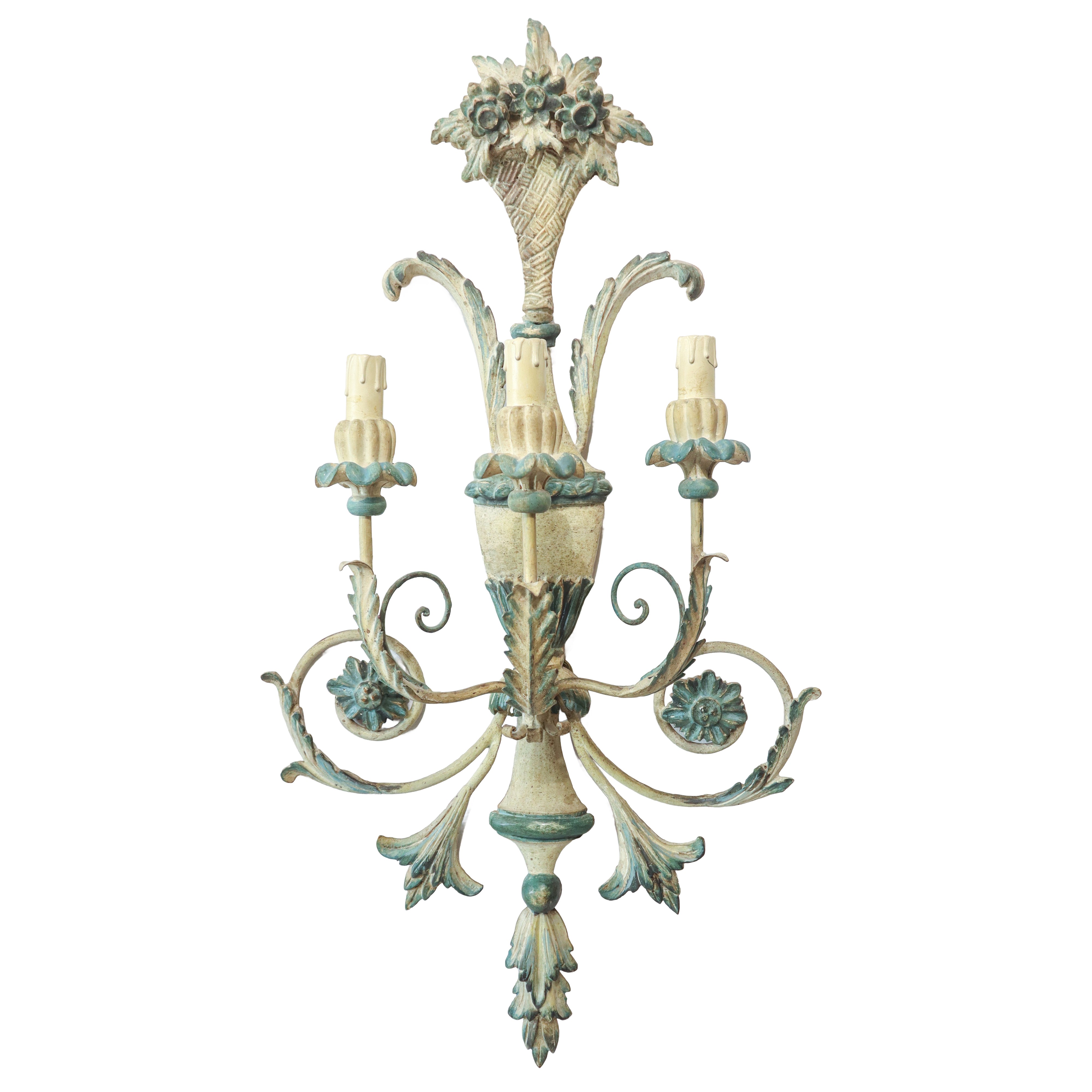 Coppia di appliques in legno colorato celeste e bianco