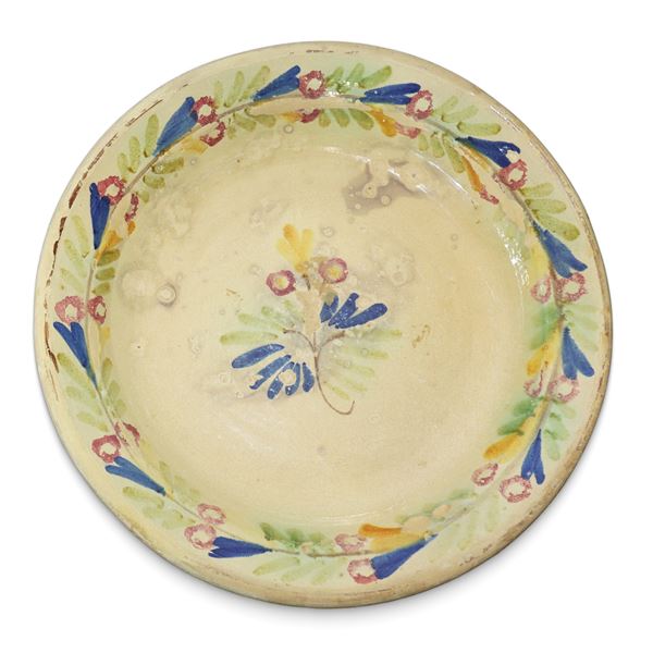 Piatto in maiolica di Caltagirone invetriato policromo