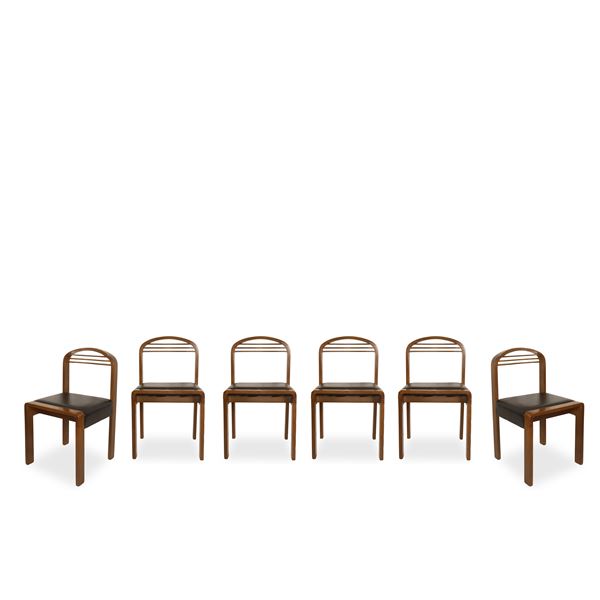 6 wooden chairs with black leather seats