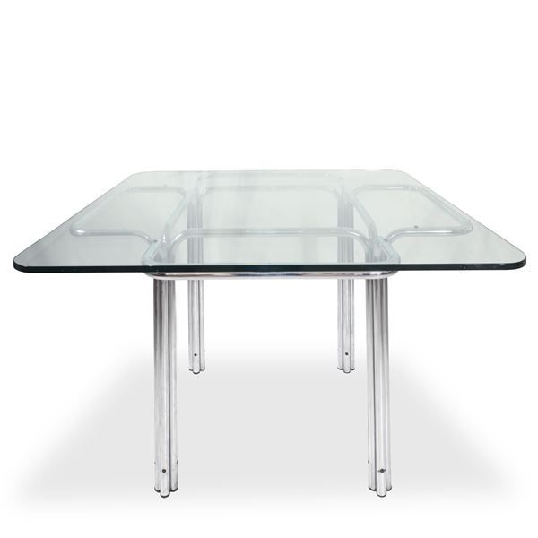 Gruppo DAM  per Busnelli - Topos model table with silver chromed metal structure that starts from the ground and opens like a flower to support a square glass top
