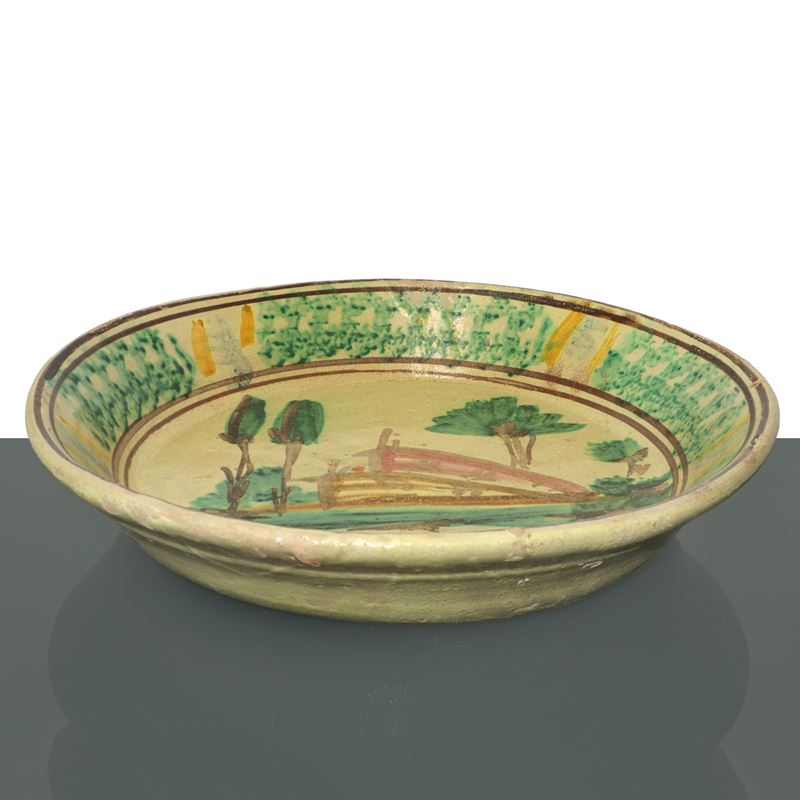 Piatto in maiolica di Caltagirone dipinto al centro con alberi