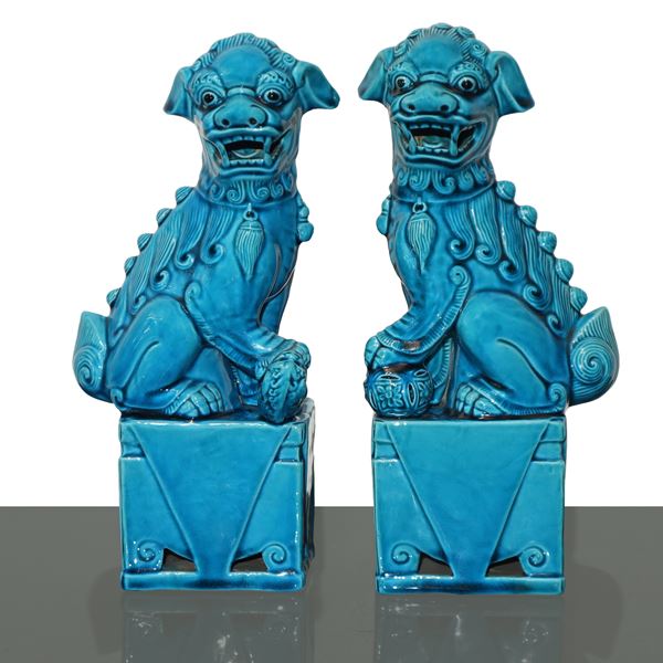 Pair of Fo dog bookends in blue colored majolica
