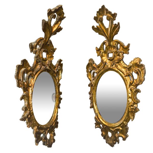 Coppia di specchiere in cornice dorata