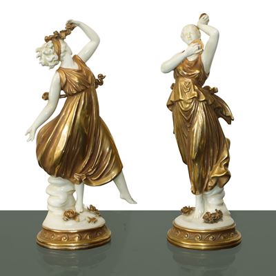 Coppia di Figure in Porcellana Bianca e Dorata