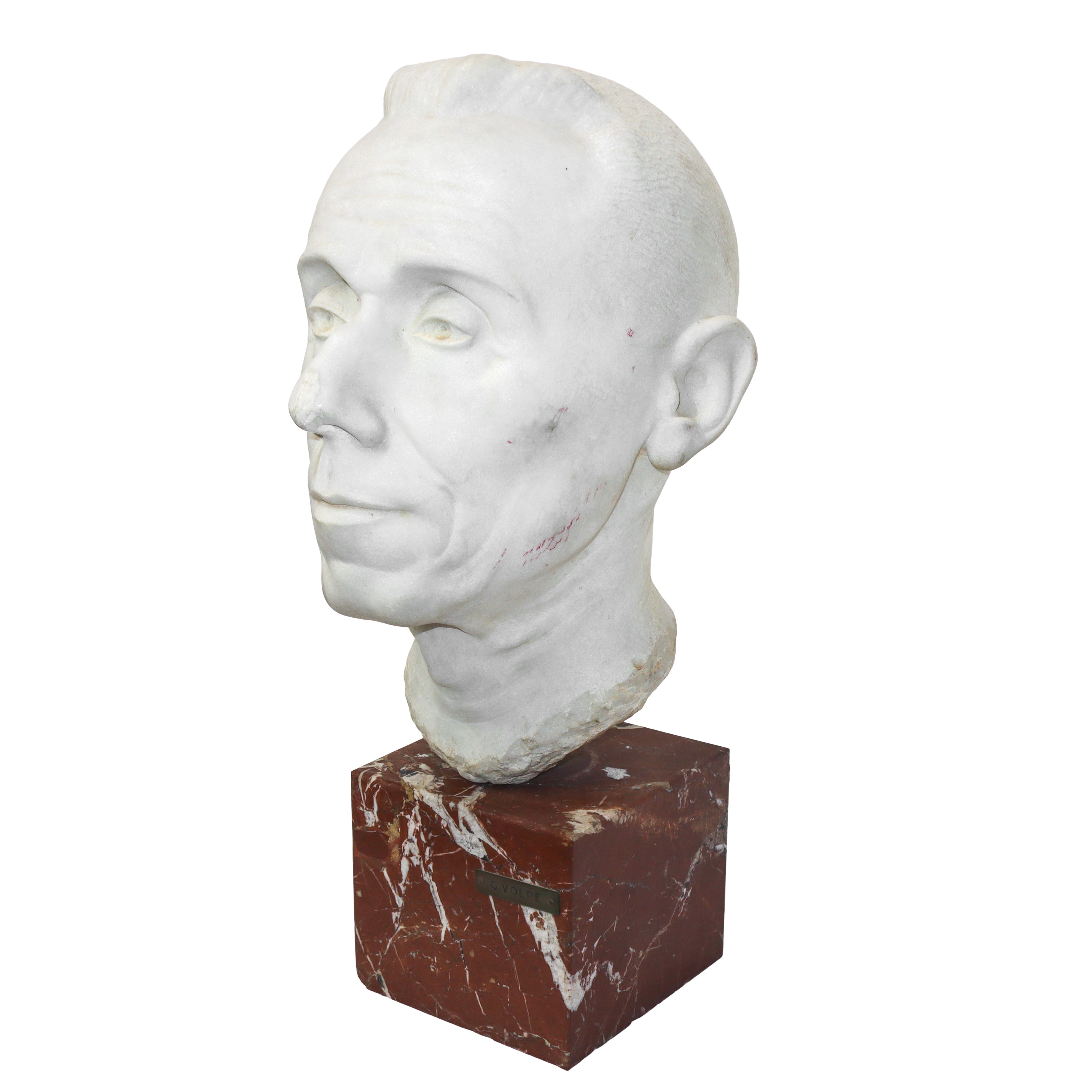 Testa di uomo, scultura in marmo bianco con base in marmo rosso