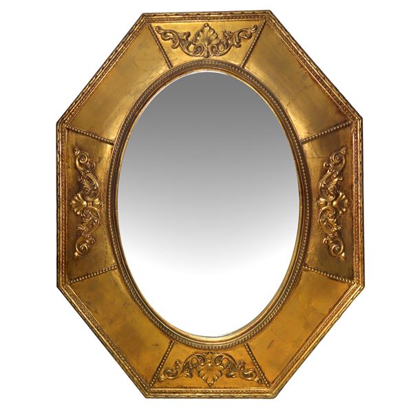 Oval mirror in octagonal golden frame