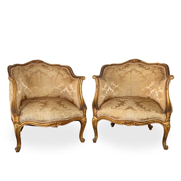 Coppia di poltrone in legno dorato