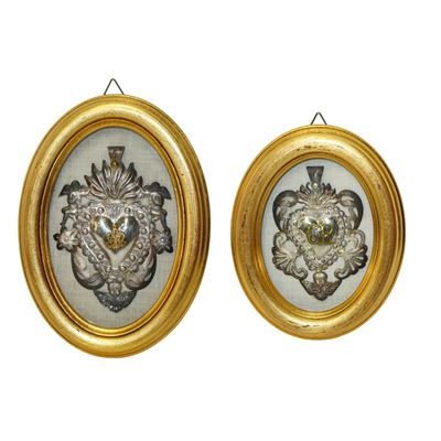 Coppia di Ex Voto in argento, cornici ovali dorate