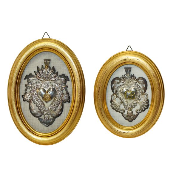 Coppia Ex Voto in argento in cornice ovale dorata