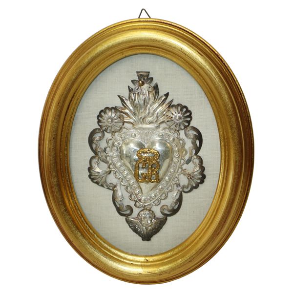 Ex Voto in argento 800 in cornice ovale dorata