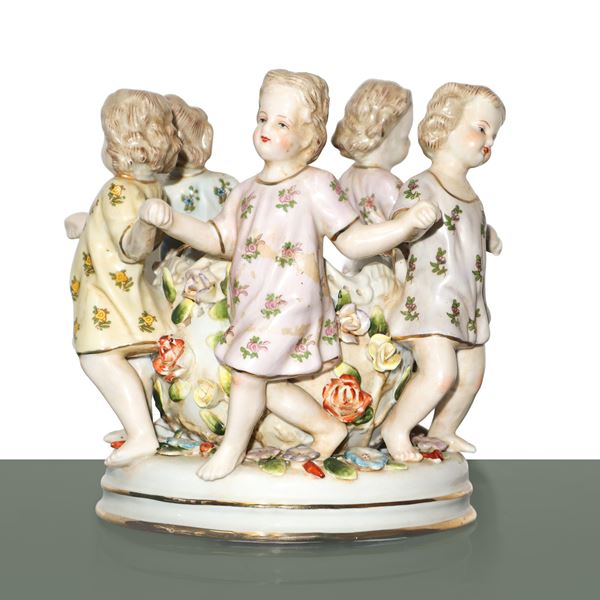 Decorative porcelain vase with children and flowers