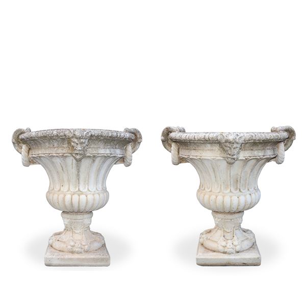 Pair of large crater-shaped cement mortar vases