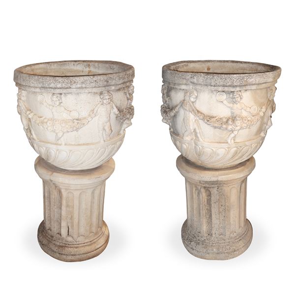Pair of cement mortar vases with column base