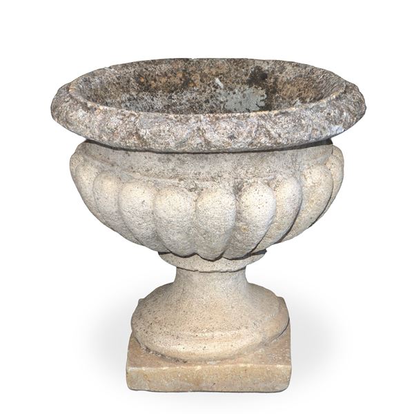 Small crater-shaped cement mortar vase