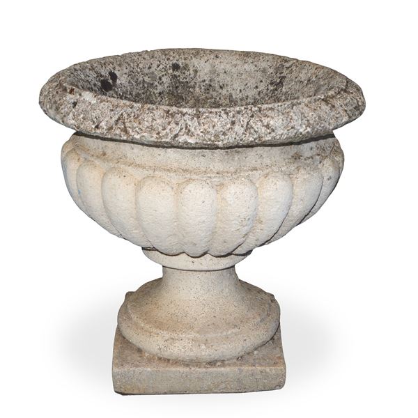 Small crater-shaped cement mortar vase