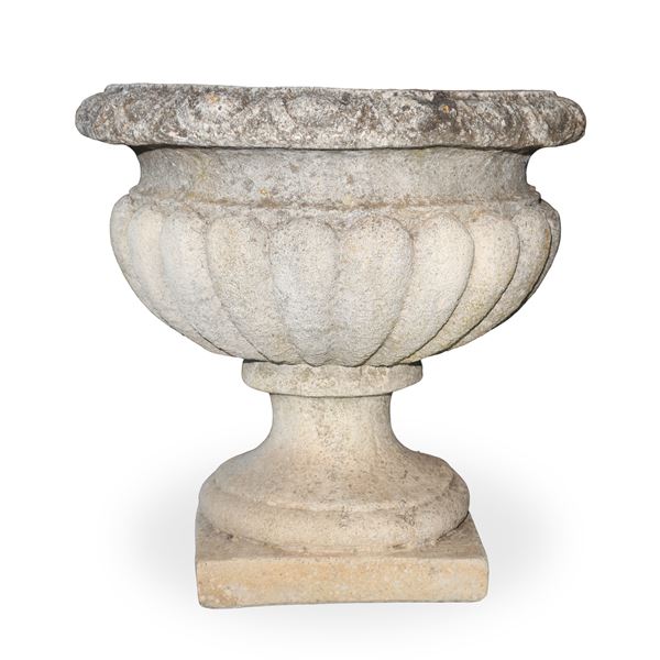 Small crater-shaped cement mortar vase