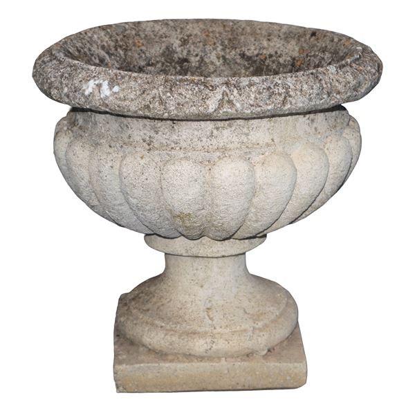 Small crater-shaped cement mortar vase