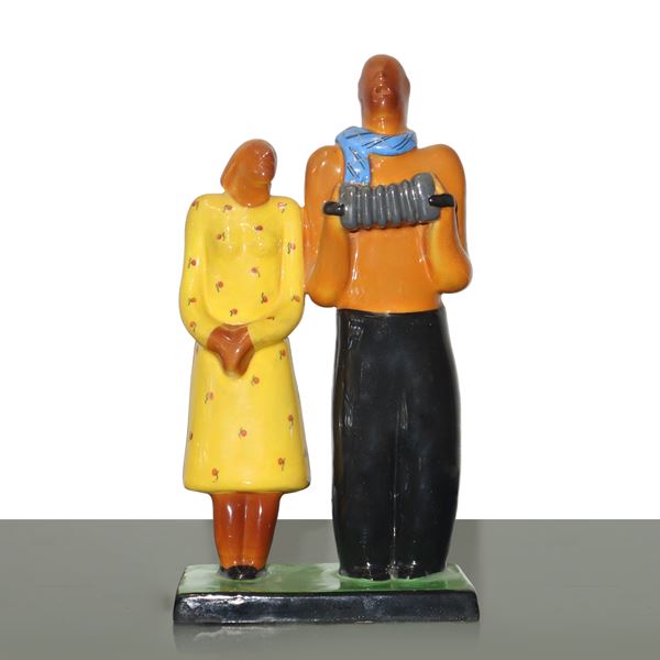 Rometti Umbertide  Ceramiche - Pair of terracotta figurines modeled with a polychrome enamel mold