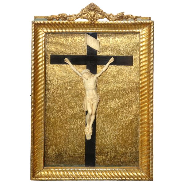 Crucified Jesus in a golden wooden case