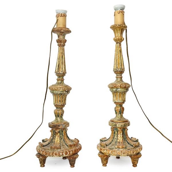 Pair of carved and sculpted wooden candlesticks