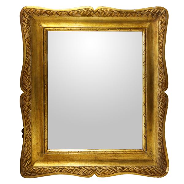 Mirror in a gilded tray frame