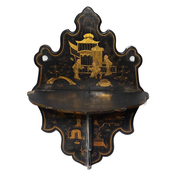 Small Japanese shelf and wall plaque in papier-mâché with scenes of everyday life painted in gold on black lacquer