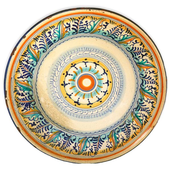 Polychrome painted majolica plate