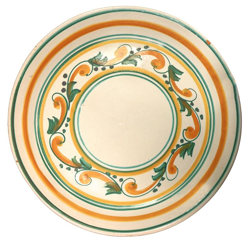 Piatto in maiolica di Santo Stefano di Camastra dipinto policromo nei toni del verde e dell'aranc...
