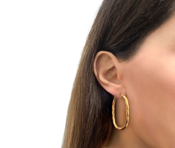 750 yellow gold curl earrings