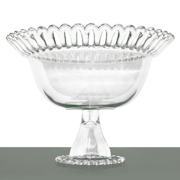 Clear glass stand with perforated edge