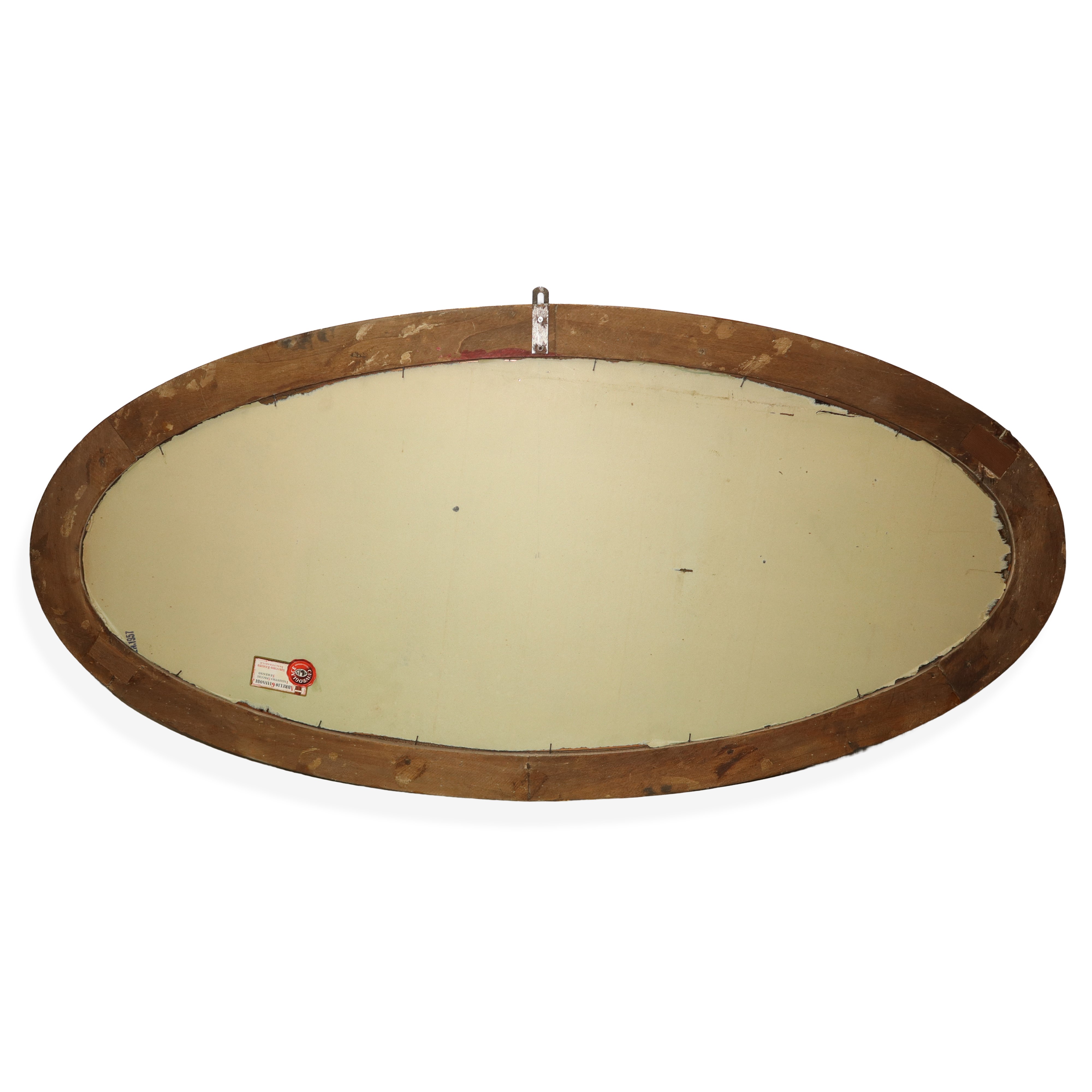 Grande specchiera ovale in cornice dorata