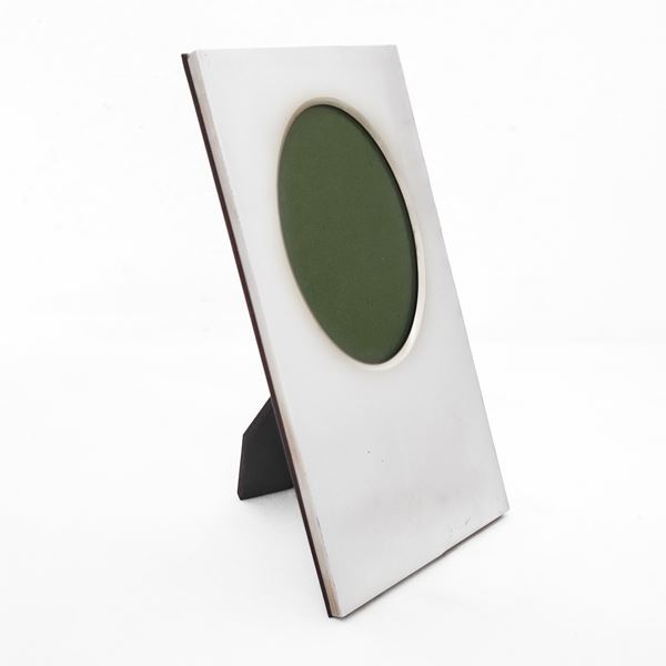 Cornice rettangolare in argento 800 con vano portafoto ovale