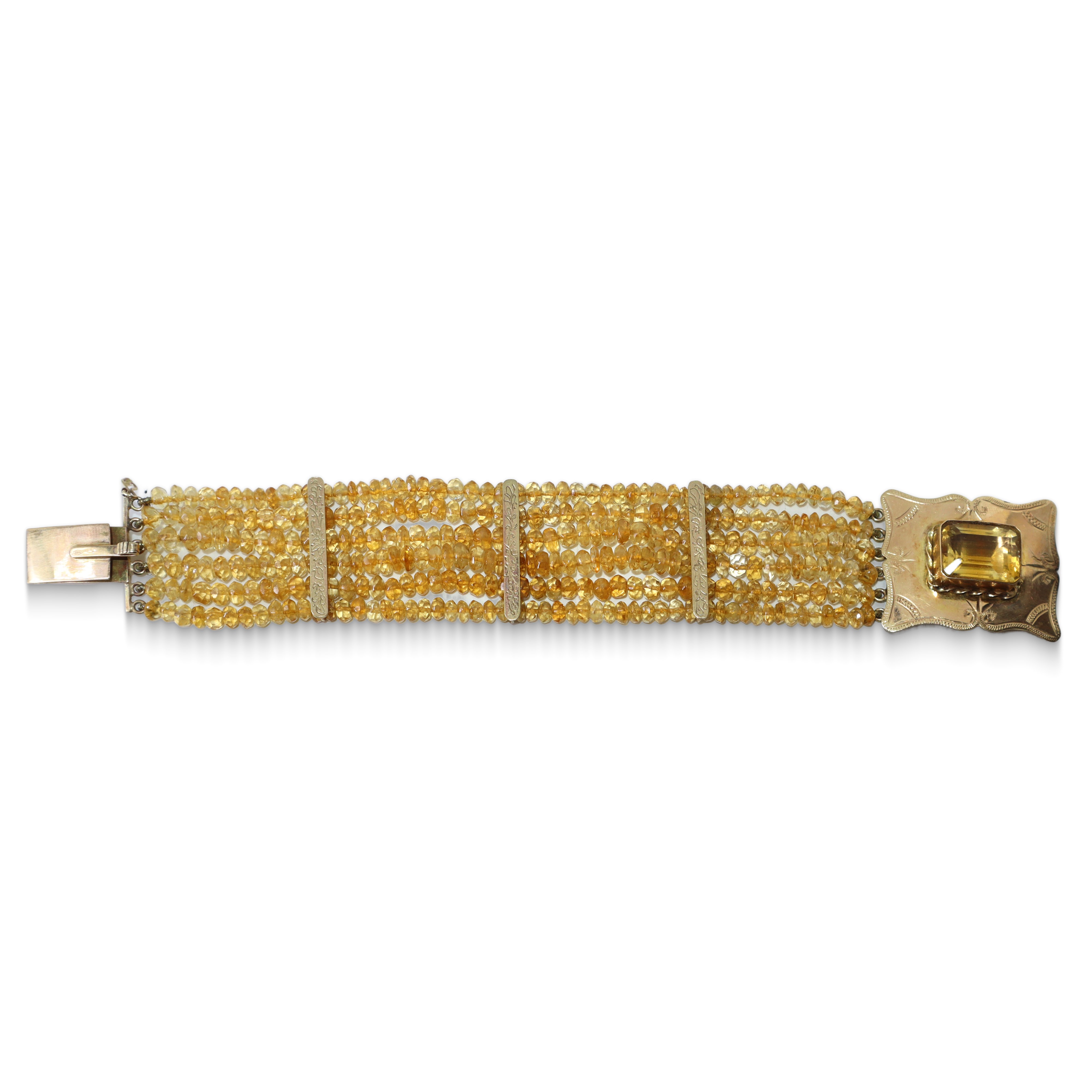 Bracciale in oro 12 carati con quarzi citrini e topazio