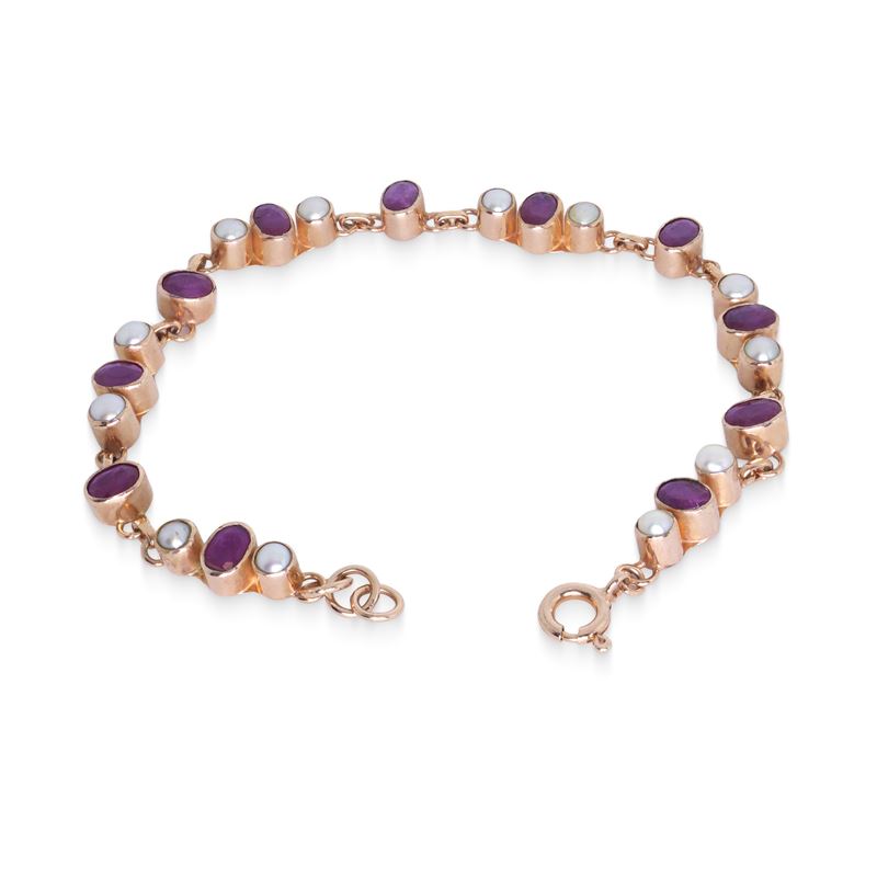 Bracciale in argento 925 con granati e perline