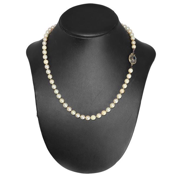 Pearl necklace with 750 yellow gold jewel