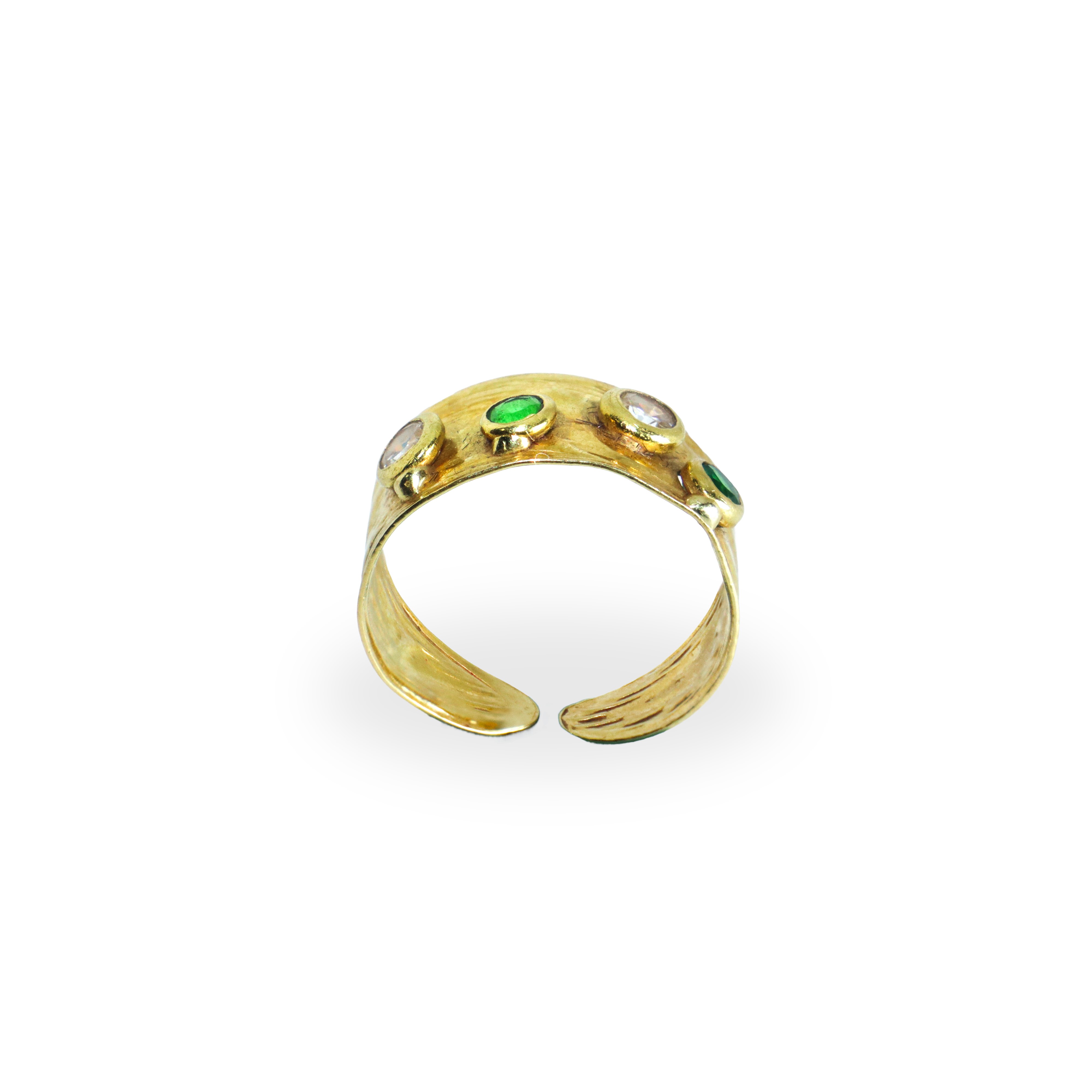 Anello a fascia regolabile in oro giallo 750 con decorazione di 4 pietre