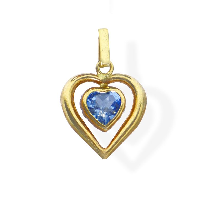 Pendentif a forma di cuore in oro giallo 750 con acquamarina centrale