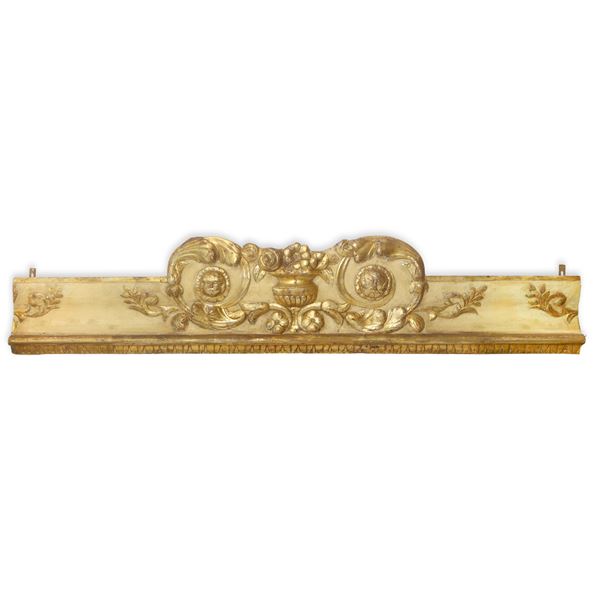 Lacquered and gilded wooden fragment carved and embossed with large garlands and floral motifs