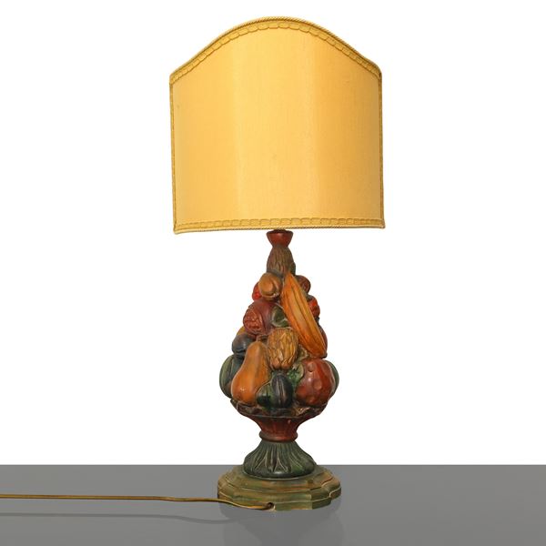 Table lamp with carved wooden base with an abundance of painted and lacquered fruits