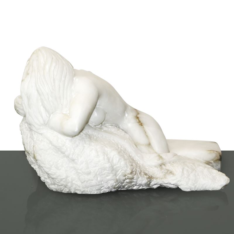 Nudo di donna sdraiata di schiena