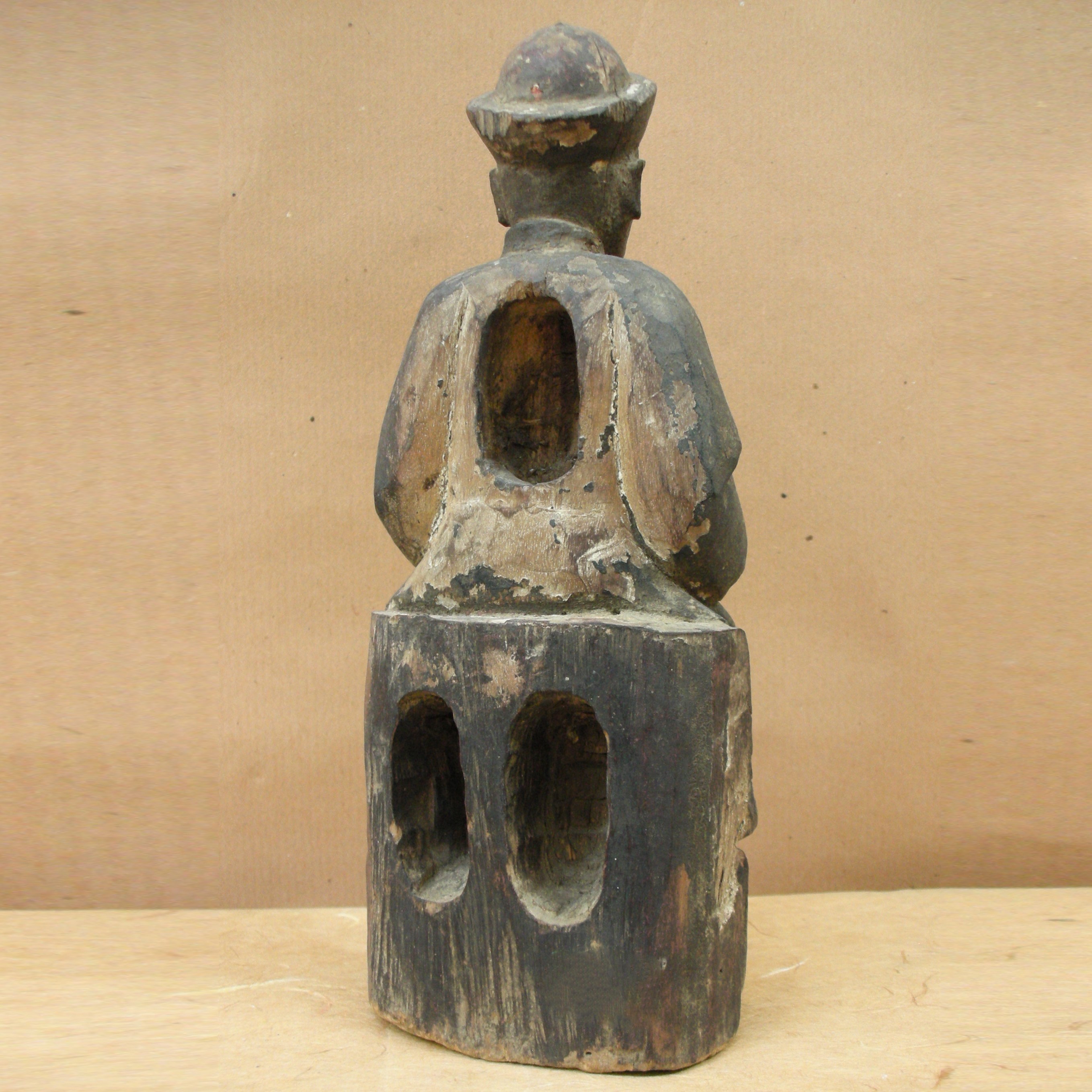 Dio del fiume, scultura in legno