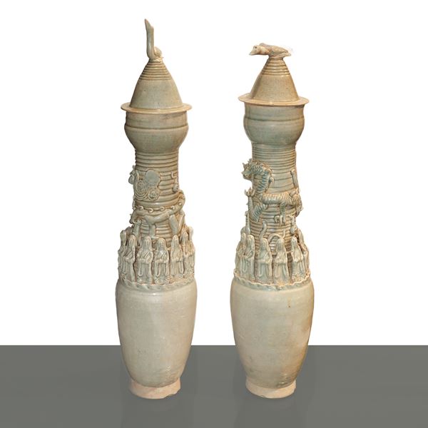 A pair of white-painted pottery vases with dragons and figures. Song Dynasty.